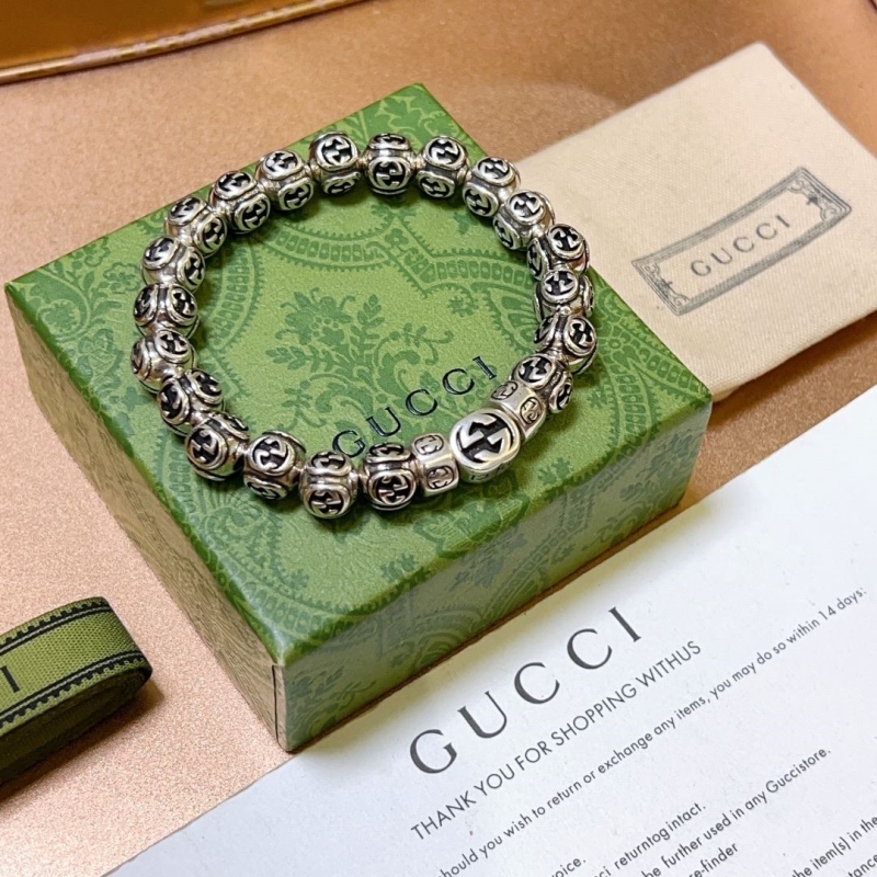 G*u*i bracelets